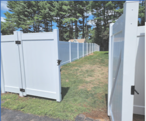 a small white vinyl fence fencing work.